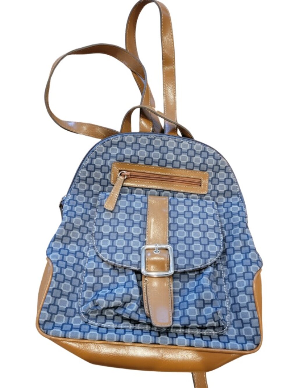Nine West backpack purse featuring a geometric pattern and brown faux leather tr